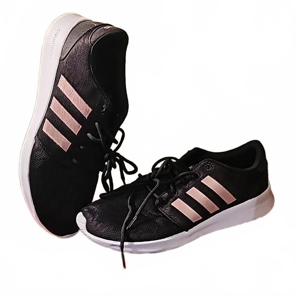 Adidas running shoes black lace overlay with rose stripes. Size 8